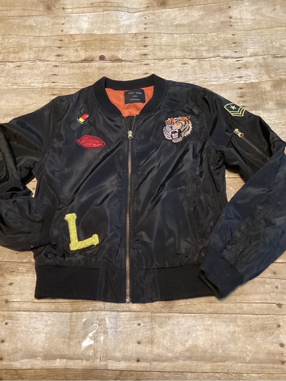 Women’s Black Bomber Jacket with Patch Details